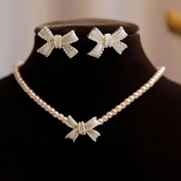 Modieuze nieuwe parel strik hanger ketting oorbel set, lichte luxe damesaccessoires Afrikaanse sieraden